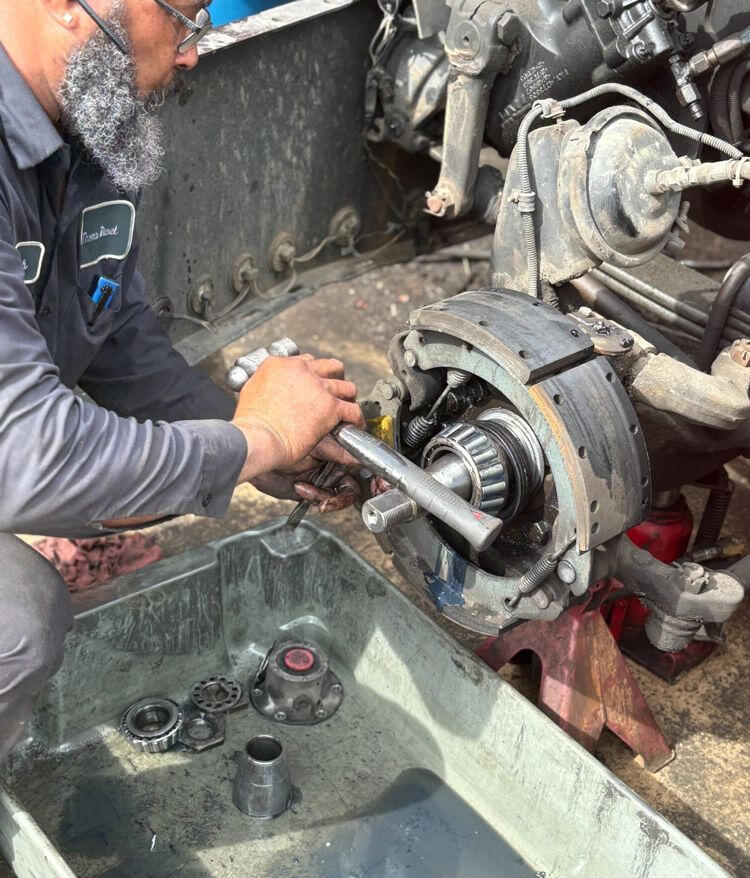 Charles repairing brake assembly